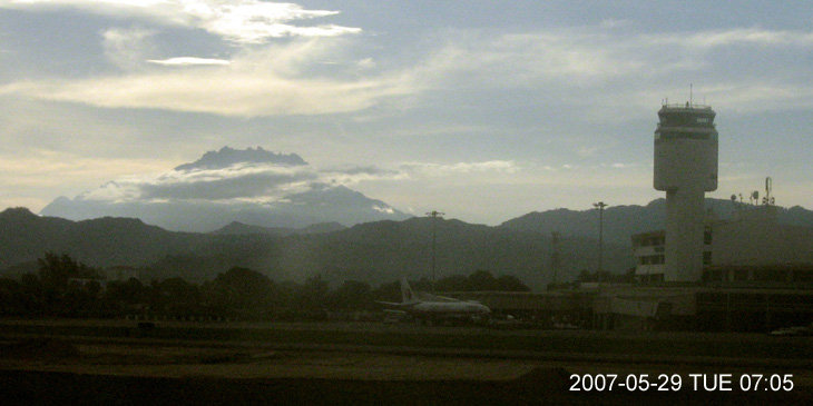 Mount Kinabalu at the background of Kota Kinabalu International Airport in early morning.