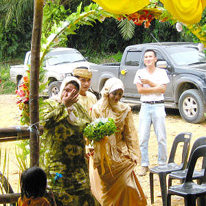 A Wedding Ceremony in an oil palm plantation in Malaysia